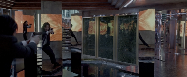 Wide shot frame from John Wick: Chapter Two — standing, walking, suit