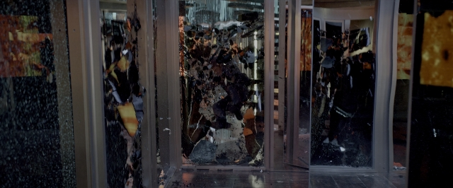 Wide shot frame from John Wick: Chapter Two — standing, room, door