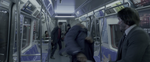 Wide shot frame from John Wick: Chapter Two — standing, dialogue, phone