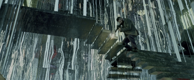 Wide shot frame from John Wick: Chapter Two — walking, hand, suit