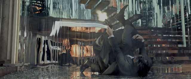Wide shot frame from John Wick: Chapter Two — hand, suit, tie