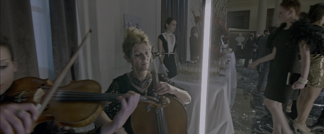 Wide shot frame from John Wick: Chapter Two — room, mirror, dress