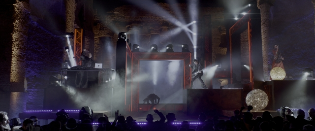 Wide shot frame from John Wick: Chapter Two — standing, suit, person
