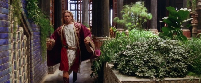 Wide shot frame from Alexander — walking, hand, bag