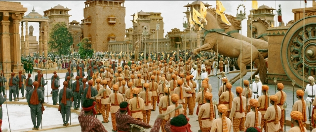 Wide shot frame from Bãhubali 2: The Conclusion — horse, train, person