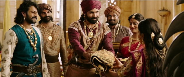 Wide shot frame from Bãhubali 2: The Conclusion — room, bird, person