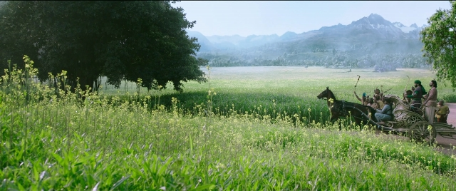 Wide shot frame from Bãhubali 2: The Conclusion — horse, cart, train