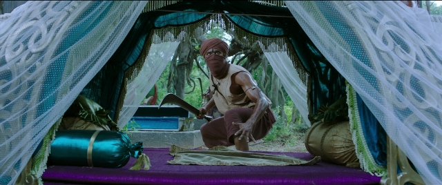 Frame from Bãhubali 2: The Conclusion — hand, tent, person
