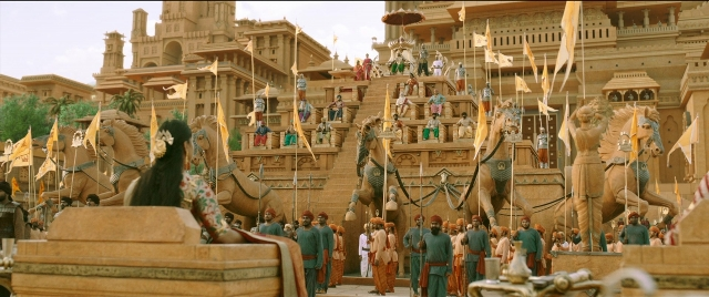 Wide shot frame from Bãhubali 2: The Conclusion — horse, train, person