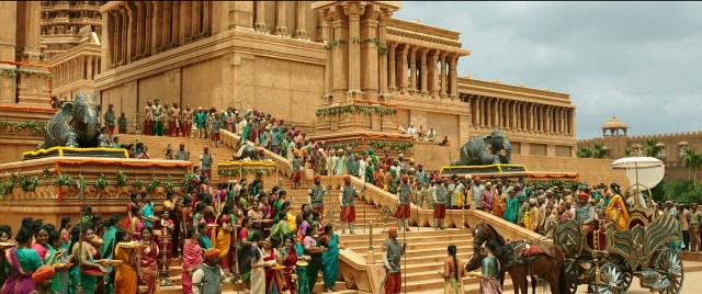 Wide shot frame from Bãhubali 2: The Conclusion — standing, horse, train
