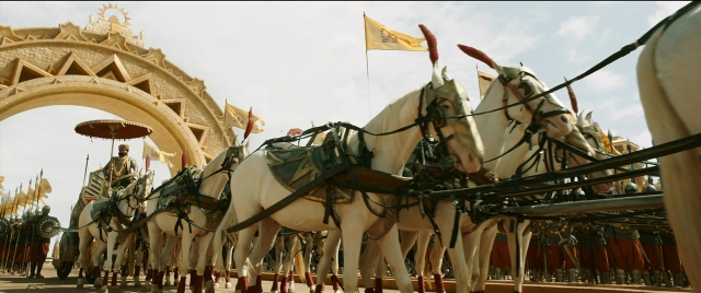Frame from Bãhubali 2: The Conclusion — horse, train, person