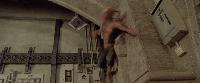 Wide shot frame from Spider-Man 2 — people, action, show