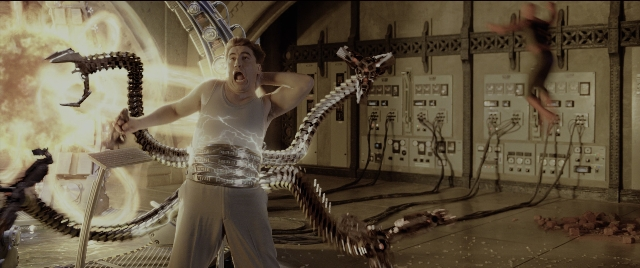 Wide shot frame from Spider-Man 2 — standing, room, fire