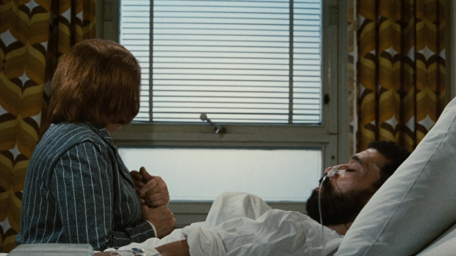 Wide shot frame from Angst essen Seele auf — standing, room, bed