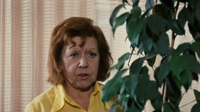Medium shot frame from Angst essen Seele auf — standing, face, hair