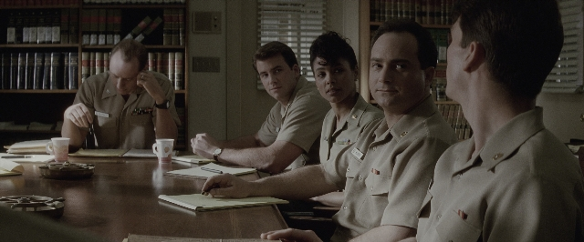 Wide shot frame from A Few Good Men — sitting, table, dialogue