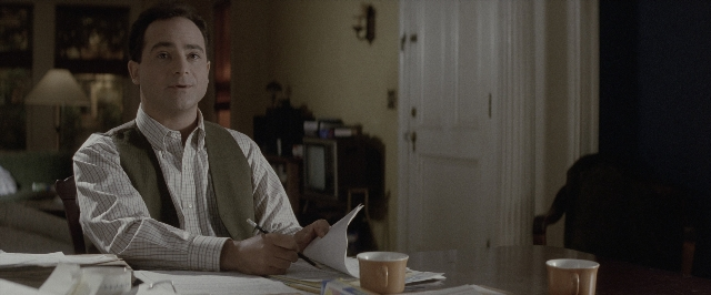 Wide shot frame from A Few Good Men — sitting, room, table