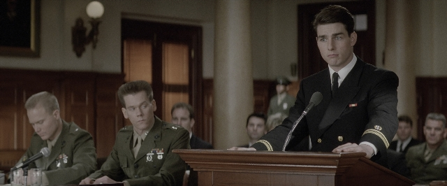 Wide shot frame from A Few Good Men — sitting, standing, room