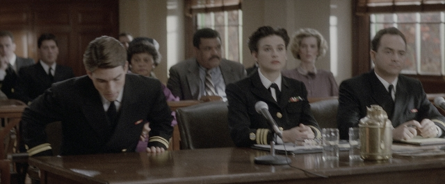 Wide shot frame from A Few Good Men — sitting, room, table