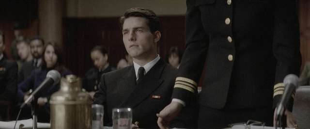 Wide shot frame from A Few Good Men — sitting, standing, room