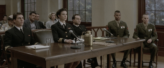 Wide shot frame from A Few Good Men — sitting, room, table