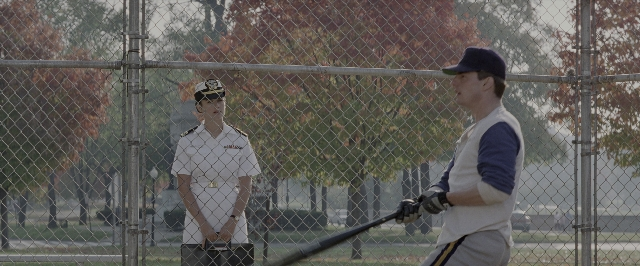 Wide shot frame from A Few Good Men — standing, hat, uniform