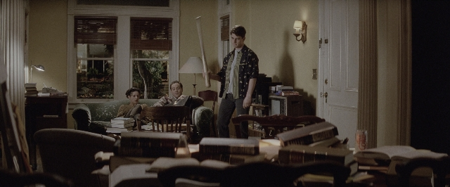 Medium shot frame from A Few Good Men — sitting, standing, room