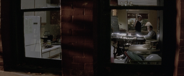 Wide shot frame from A Few Good Men — sitting, room, table