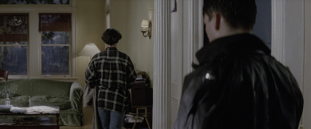 Wide shot frame from A Few Good Men — standing, room, table
