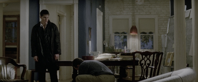 Wide shot frame from A Few Good Men — standing, room, table