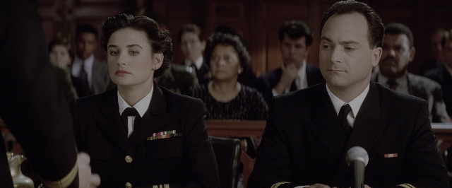 Wide shot frame from A Few Good Men — sitting, room, table