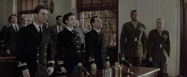 Wide shot frame from A Few Good Men — standing, room, table