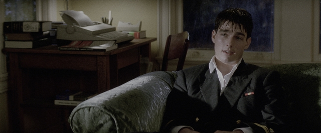 Wide shot frame from A Few Good Men — sitting, room, suit