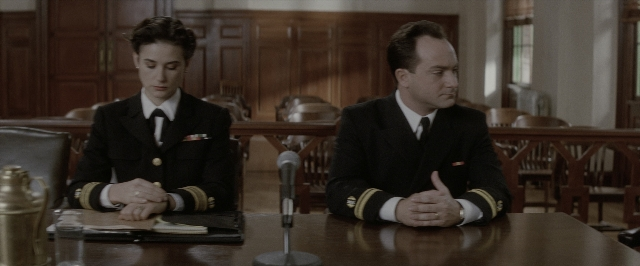 Wide shot frame from A Few Good Men — sitting, table, uniform