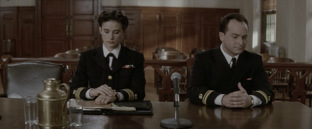 Wide shot frame from A Few Good Men — sitting, table, uniform