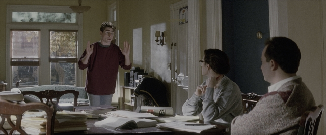 Wide shot frame from A Few Good Men — standing, room, table