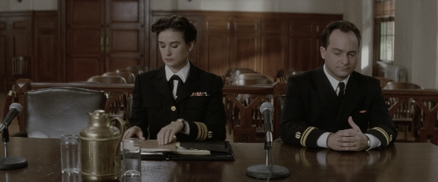Wide shot frame from A Few Good Men — sitting, table, uniform