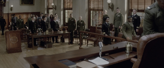 Wide shot frame from A Few Good Men — book, standing, room