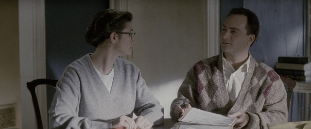 Wide shot frame from A Few Good Men — sitting, room, table