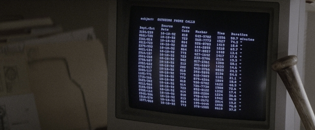 Wide shot frame from A Few Good Men — room, table, phone