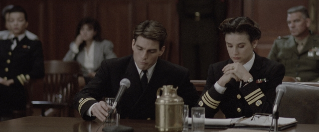 Wide shot frame from A Few Good Men — sitting, room, table