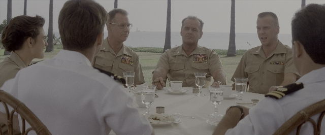 Wide shot frame from A Few Good Men — sitting, table, dialogue