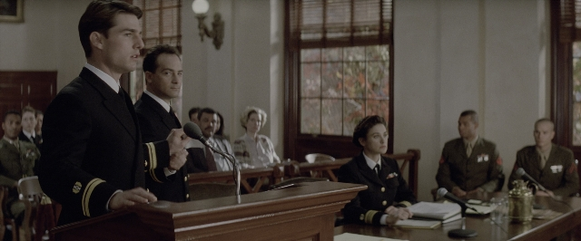 Wide shot frame from A Few Good Men — sitting, standing, room