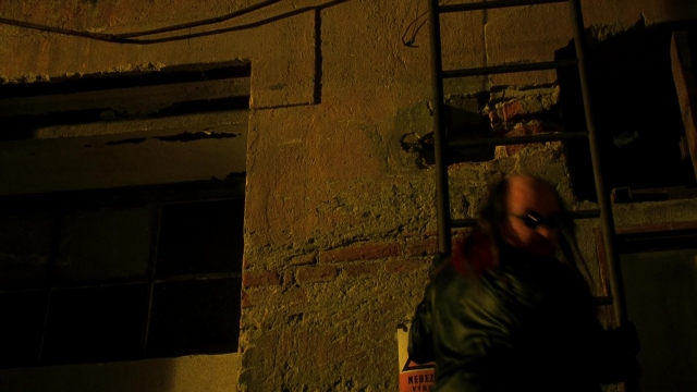 Wide shot frame from Blade II — people, standing, dialogue