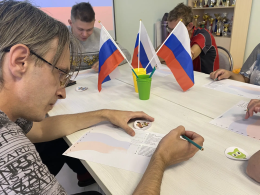 Под флагом России