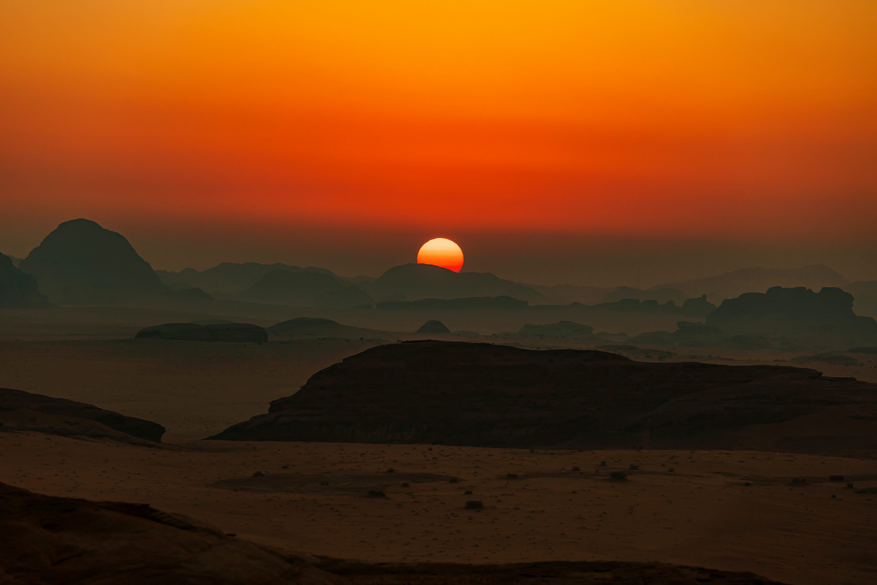 Wide desert panorama fading into mountains
