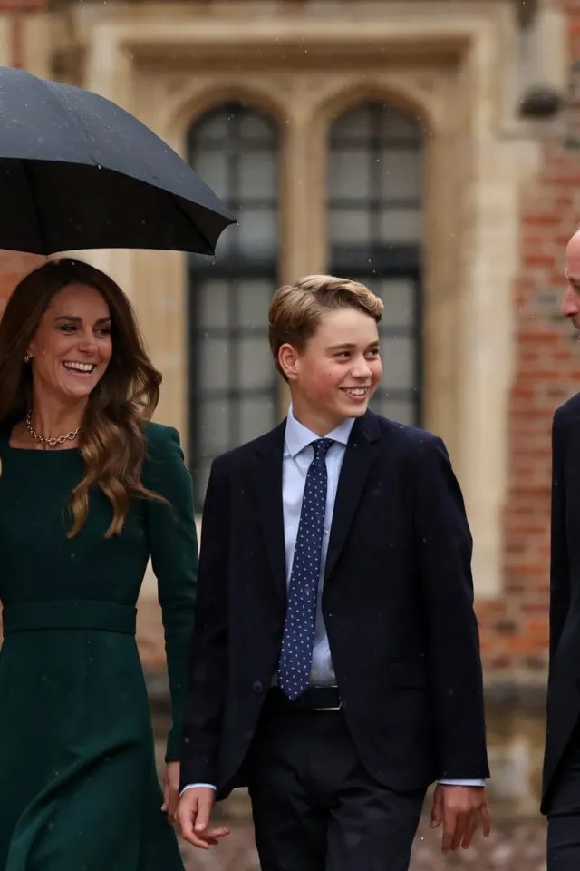 ETON, ENGLAND - SEPTEMBER 8: Catherine, Princess of Wales (L) and Prince William, Prince of Wales (R) walk with their 13-year-old son, Prince George of Wales (C), as he arrives for