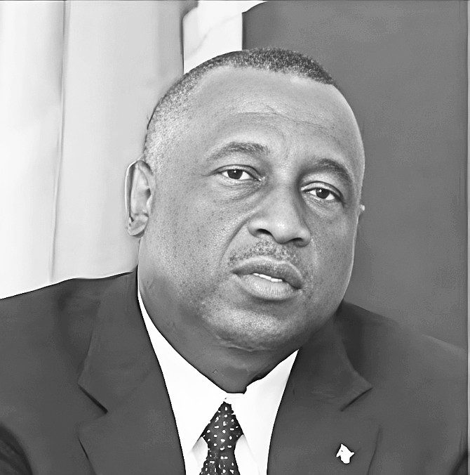 Former Cabinet Minister Neville Wisdom