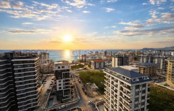Светлая квартира 1+1 на высоком этаже в престижном комплексе в Турции - фото 3