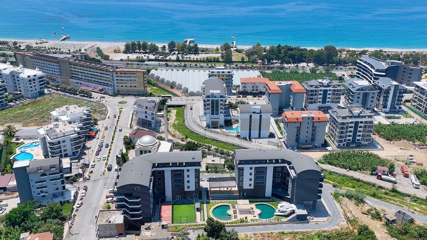 Квартира 1+1 в новом комплексе в 250 м до моря, Каргыджак в Турции - фото 4